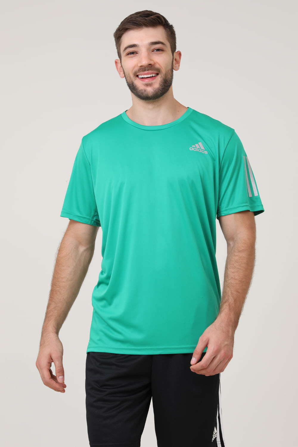 CAMISETA  OWN THE RUN TEE IC7629 COUGRN/REFSIL P